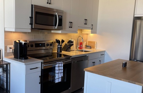 Exchange District Condo | Exclusive NY Style Condo with Free Parking in Exchange District