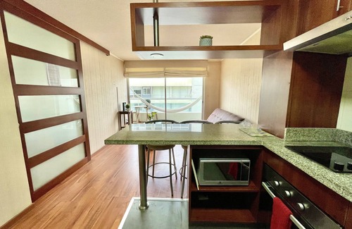 San Miguel Condo | Inviting Airport Proximity with Ocean View & Free Pool Access