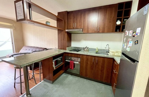 San Miguel Condo | Inviting Airport Proximity with Ocean View & Free Pool Access