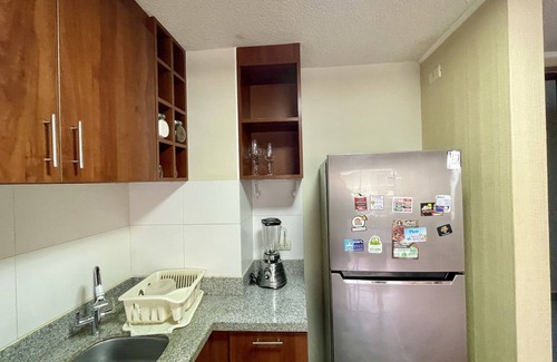 San Miguel Condo | Inviting Airport Proximity with Ocean View & Free Pool Access