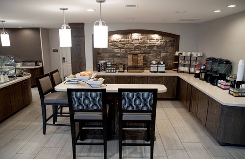 Auburn Hills Condo | Unwind with Free Wi-Fi, Breakfast & Pool Access