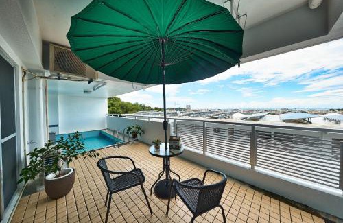 Okinawa Apartment | Experience FreedomHills A棟: Oceanfront Comfort Awaits