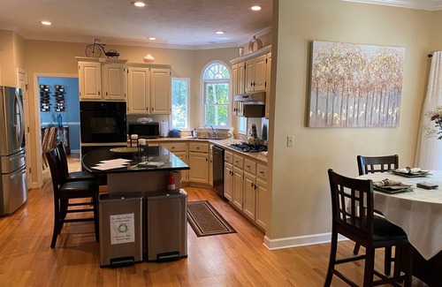 Aiken House | Elegant French Tudor Retreat in Serene Aiken County