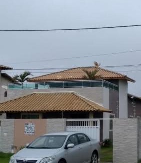 Barra de Sao Joao House | Relax by the Ocean at Frente a Praia with 9.9/10 Score