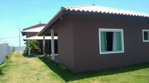 Barra de Sao Joao House | Relax by the Ocean at Frente a Praia with 9.9/10 Score