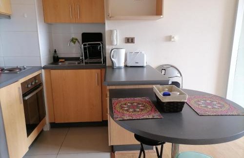 Hualpen Apartment | Convenient Hotel Steps from Mall Trebol with Pool Access