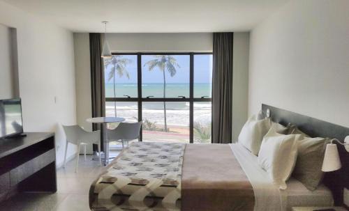 Cruz das Almas Apartment | Oceanfront Flat with Pool & Restaurant - Rated 9.6/10