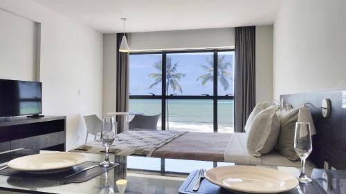 Cruz das Almas Apartment | Oceanfront Flat with Pool & Restaurant - Rated 9.6/10