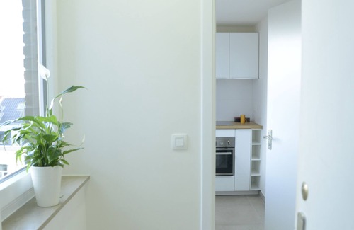 Wijk van de Squares Apartment | Modern EU Commission Area Apartment with Breakfast Included