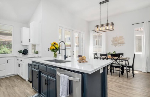 Fresno House | Fresno House: Poolside Retreat with BBQ & Firepit Amenities