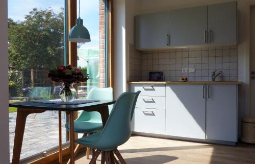 Luhe Apartment | Frida: Delightful Studio with Sunny Terrace, Rated 9.3/10