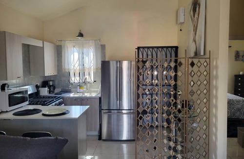 Portmore House | Comfort Home in a Friendly Gated Community with Ocean Views