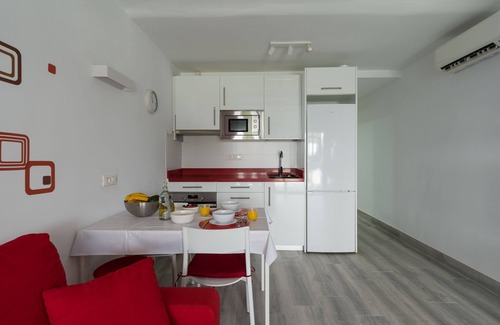 Playa del Aguila Apartment | Beautiful Frontline Retreat with Garden & Ocean View