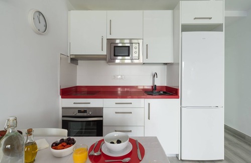 Playa del Aguila Apartment | Beautiful Frontline Retreat with Garden & Ocean View