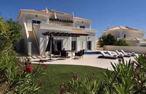 Porto de Mos Villa | Front Line Villa with 180° Sea Views & Top Amenities