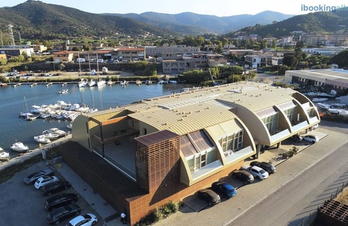 Portoferraio Apartment | Cozy Fronte Mare Suites with Kitchen & Breakfast Included