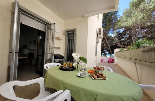 Rivabella Apartment | Beachfront Bliss at Fronte Pineta Mare Rivabella - Guest Rated 9.7