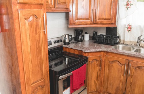 Graeme Hall Terrace Apartment | Top-Rated Frontline Apartment No. 2 with Family Amenities