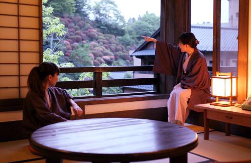 Kurokawa Onsen Hotel | Indulge at Fujiya: Exceptional Stay with Hot Tub Amenities