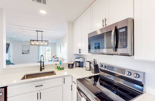 Bay Acres House | ```html
Beautiful Beach Duplex with Renovated Interior & Pet Welcome
```