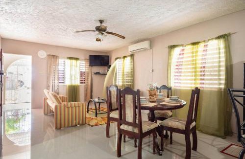 Salt Gut House | Comfortable 2BR Retreat, Steps from Ian Fleming Int Airport