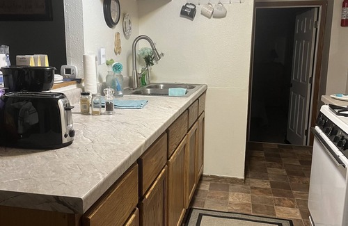 Minot Apartment | Cozy Apartment Retreat with Lake View and Breakfast