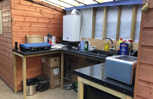 Truro Cabin | Top-Rated Glamping Experience in Benson with Private Bath
