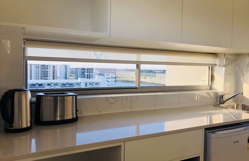 Birtinya Apartment | Cozy Studio with Child-Friendly Amenities