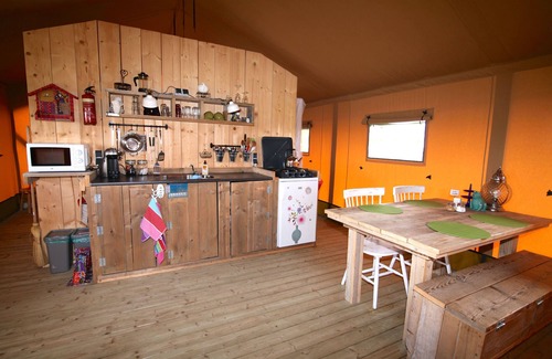 Enumatil Ski Chalet | Experience a Unique Safari Tent with Private Bathroom