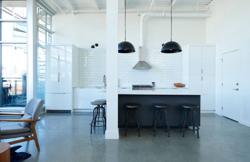 Gastown Condo | Historic Loft Retreat with Private Roof Deck and Amenities