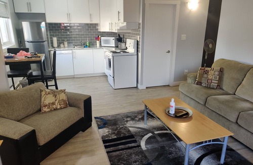 Regina Apartment | Modern 1 Bedroom Retreat with Dedicated Parking & Breakfast