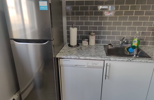 Regina Apartment | Modern 1 Bedroom Retreat with Dedicated Parking & Breakfast