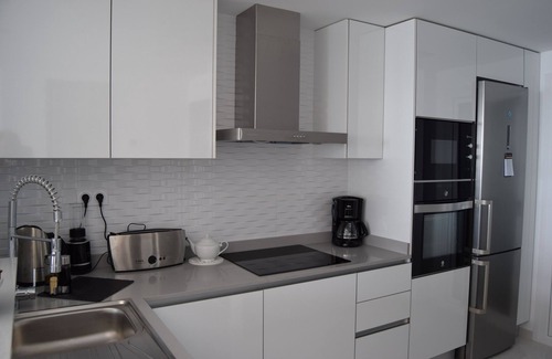Punta Prima Apartment | Family Fun by the Beach with Poolside Relaxation