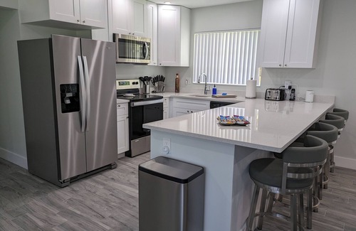 Coral Ridge House | Vibrant Beach Flat with Pool, Spa & Steps to Fun!