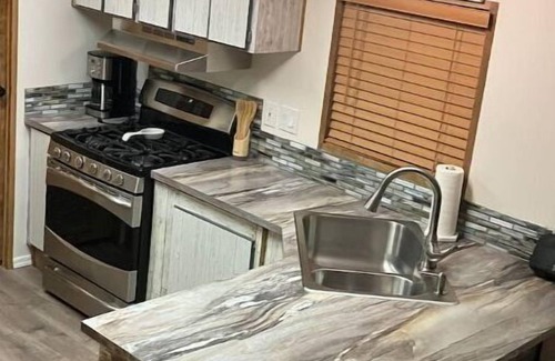 Laughlin House | Cozy Rustic 2-Bedroom Oasis with Pool and Spa Access