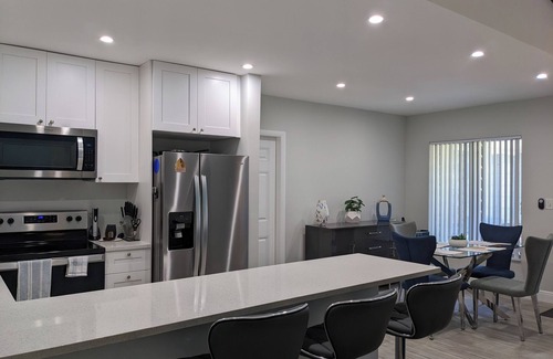 Coral Ridge House | Exciting Oasis! Shared Pool, Spa & Steps to Beach Fun!