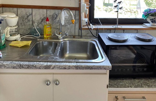 Morup House | Well-Appointed Retreat with Pool and Lake View Amenities