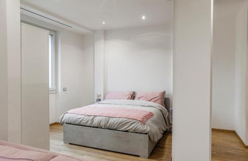 Como Apartment | Inviting Fuori Le Mura: Balcony, A/C & Child-Friendly Stay