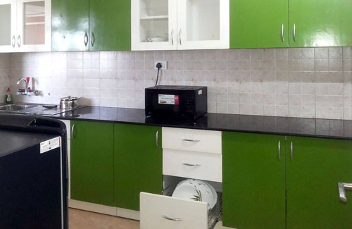 Kozhikode Apartment | Cozy A/C Deluxe Apartment in Hilite City with Kitchen Access