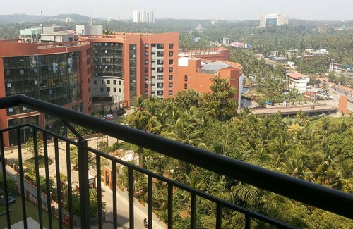 Kozhikode Apartment | Cozy A/C Deluxe Apartment in Hilite City with Kitchen Access