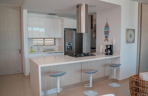 Pozos Colorados Apartment | Beachfront Apartment with Dock Access and Pool Amenities