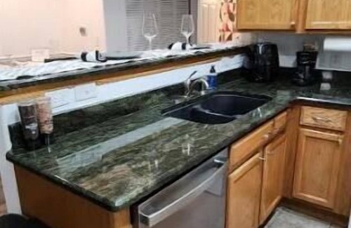 Aurora Condo | Modern Condo Retreat with Pool & Hot Tub in Aurora