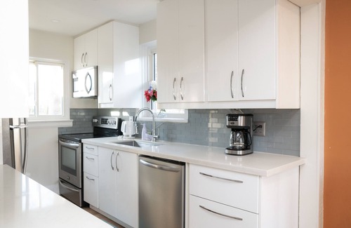 Long Branch House | Cozy 2-Bedroom Main Level Retreat with Spa and Hot Tub
