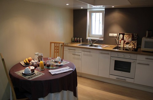Canardiere Est Apartment | Inviting 2-Bedroom Retreat with Garden & Family-Friendly Amenities