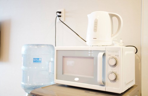 Okinawa Apartment | Convenient Stay at Mcity Furujima: Walk to Station & Wifi