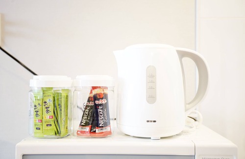 Okinawa Apartment | Convenient Stay at Mcity Furujima: Walk to Station & Wifi