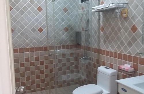 Ji'an House | Futian B&B: Highly Rated Stay with Breakfast & Kitchen