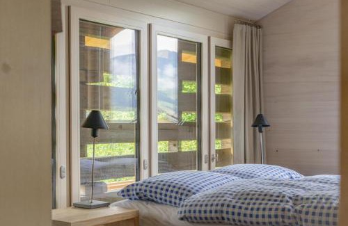 Tscheppach Apartment | Guest Rated 9.7: Oceanfront Gädeli with Family-Friendly Amenities