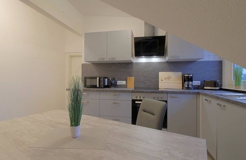 Midlum Apartment | Family-Friendly Retreat at Gästehaus Midlum with Kitchen