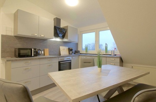 Midlum Apartment | Family-Friendly Retreat at Gästehaus Midlum with Kitchen